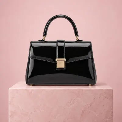 Black patent handbag - Studio - pink pedestal