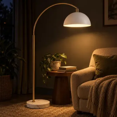 Brass arc floor lamp - Reading corner - night, close