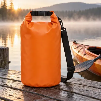 Orange dry bag - Lake dock - misty morning